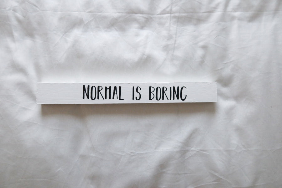 normal is boring poetry home decor stick