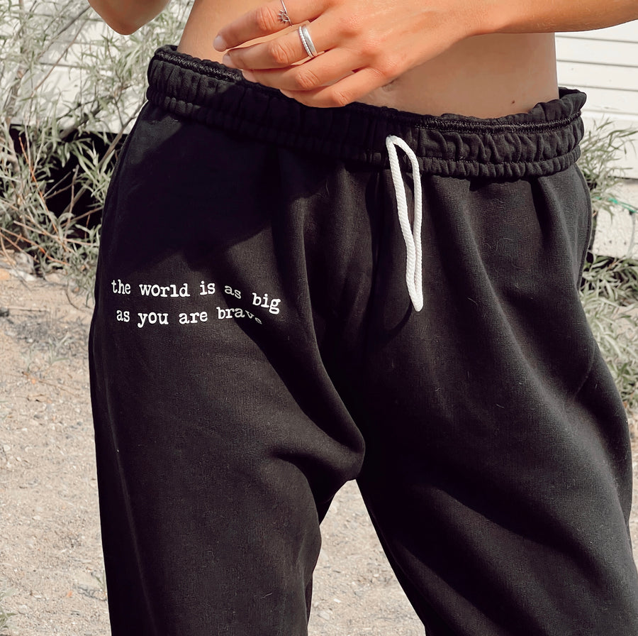 the world is as big as you are brave sweats